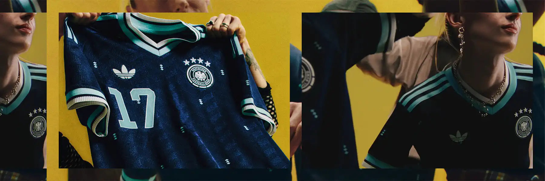 A person holds up a dark blue Germany football jersey featuring "17," adidas logo, and DFB emblem, against a yellow background, conveying pride and excitement.