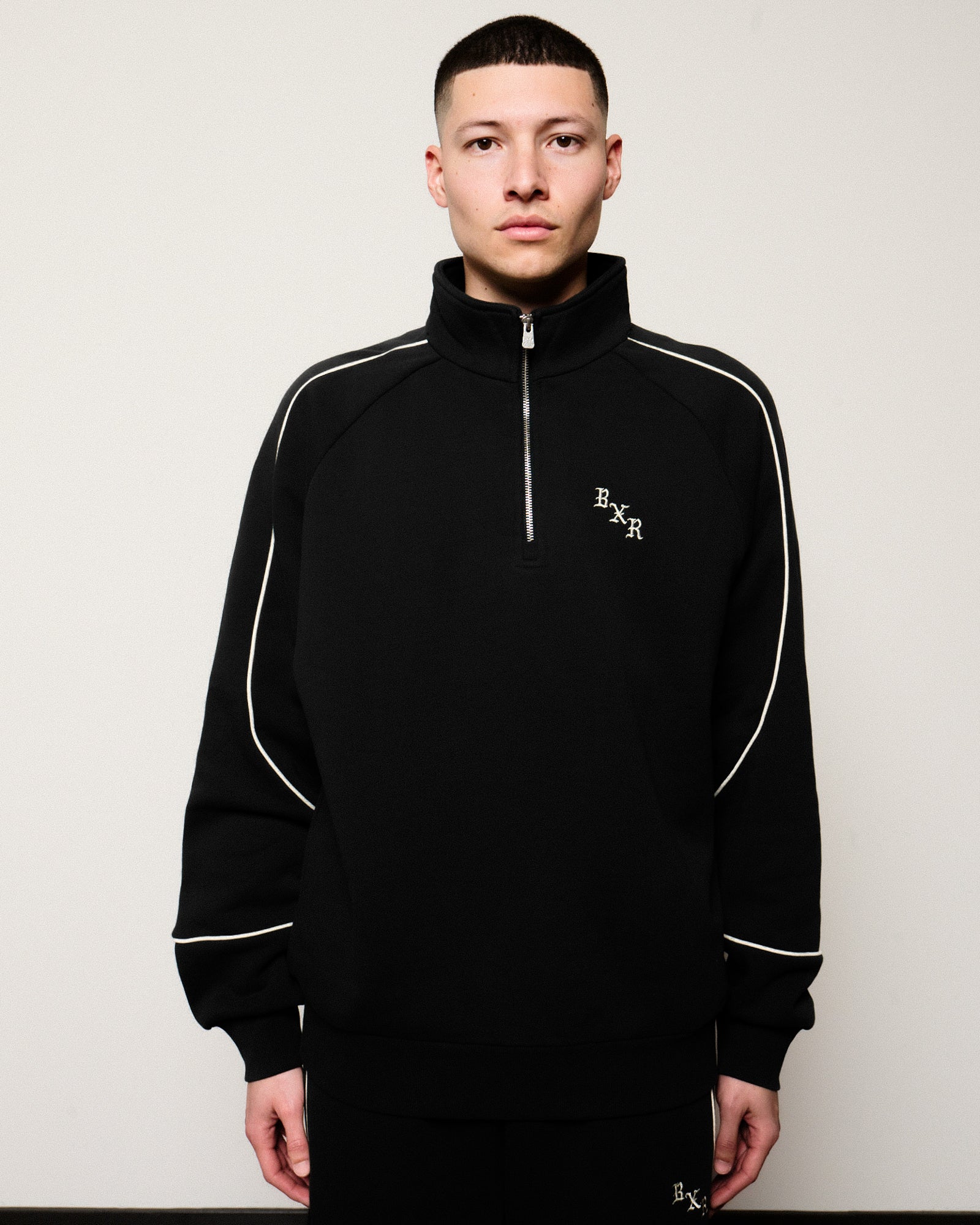Born x Raised BXR Piped Quarter Zip Sweater Black Sweatshirts B3058PIPED-BLK On Model Front View | Overkill
