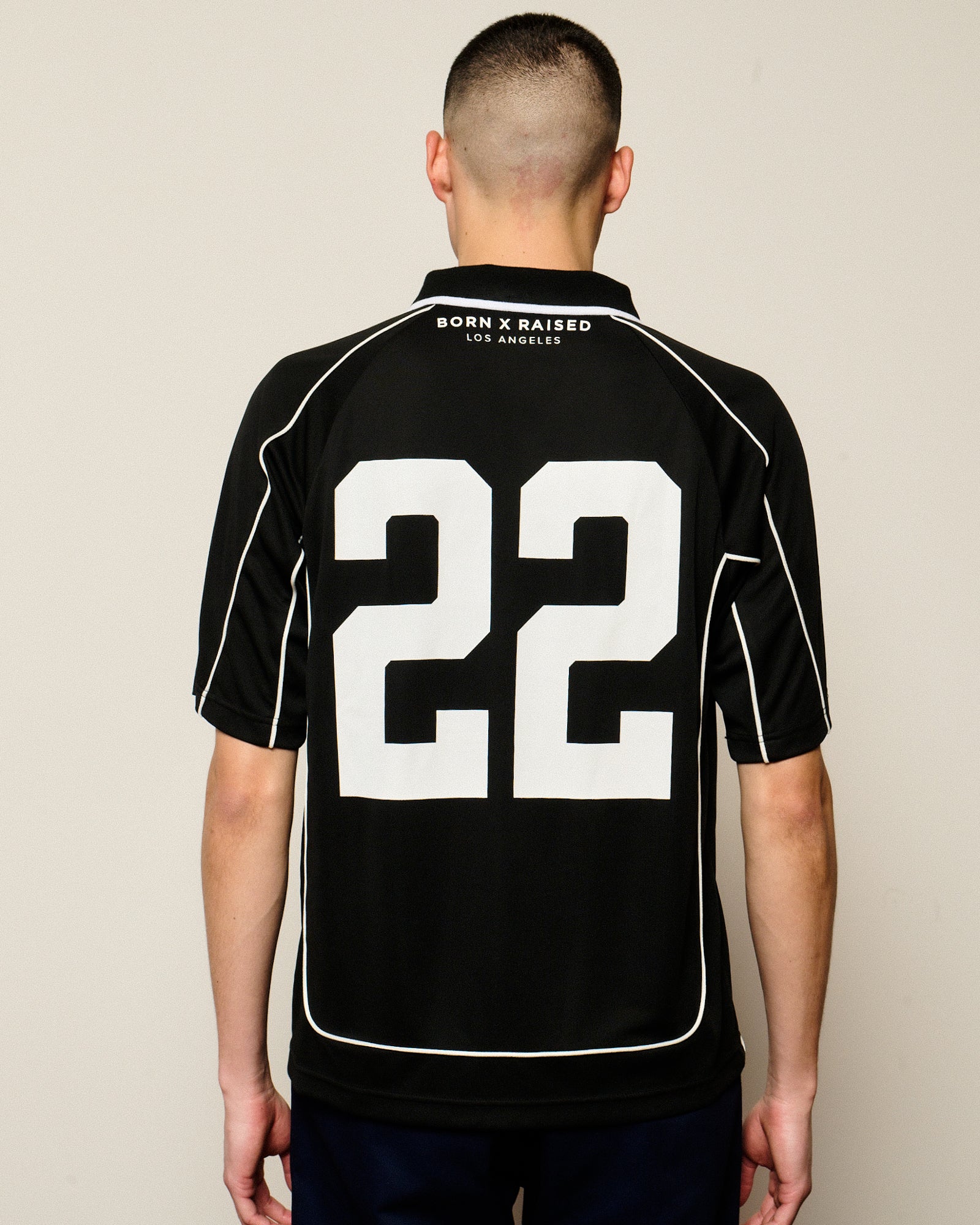 Born x Raised God Loves The Homies Jersey Black T-Shirts B4033GLHJ-BLK On Model Back View | Overkill
