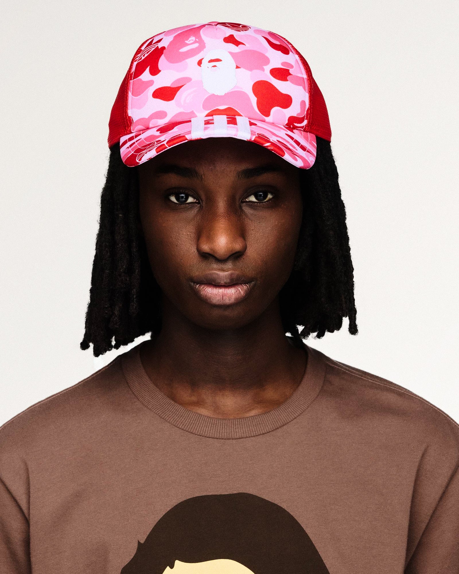 BAPE x adidas Trucker Cap Clear Pink Caps KF4919 On Model Front View | Overkill
